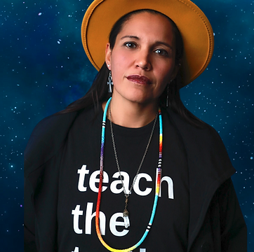 woman of color wearing hat and t-shirt that says 