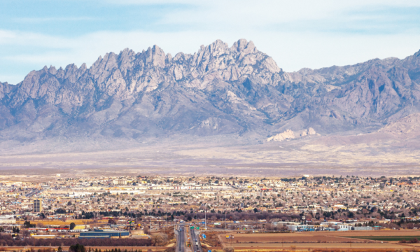 New Mexico landscape with city and mountains in background